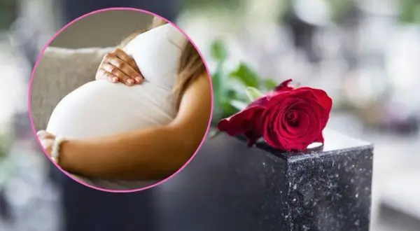 Kobieta w ciąży na pogrzebie, z dłonią na brzuchu, obok czerwonej róży na nagrobku.
